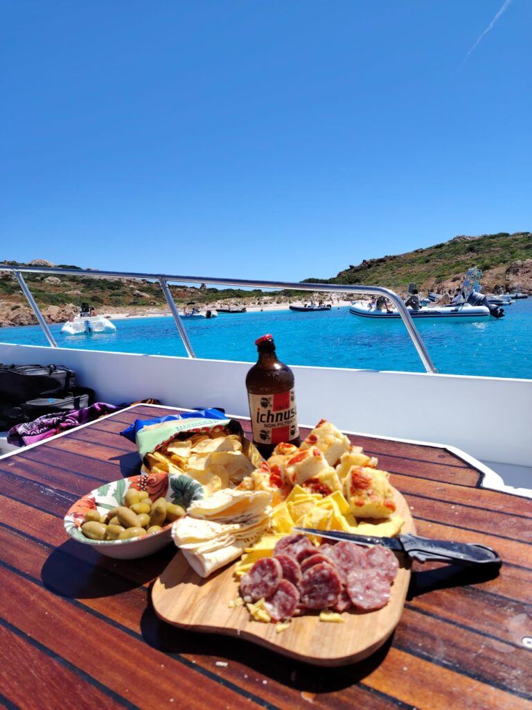 /private-boat-tour-costa-smeralda/ 8 private boat tour costa smeralda couple on boat